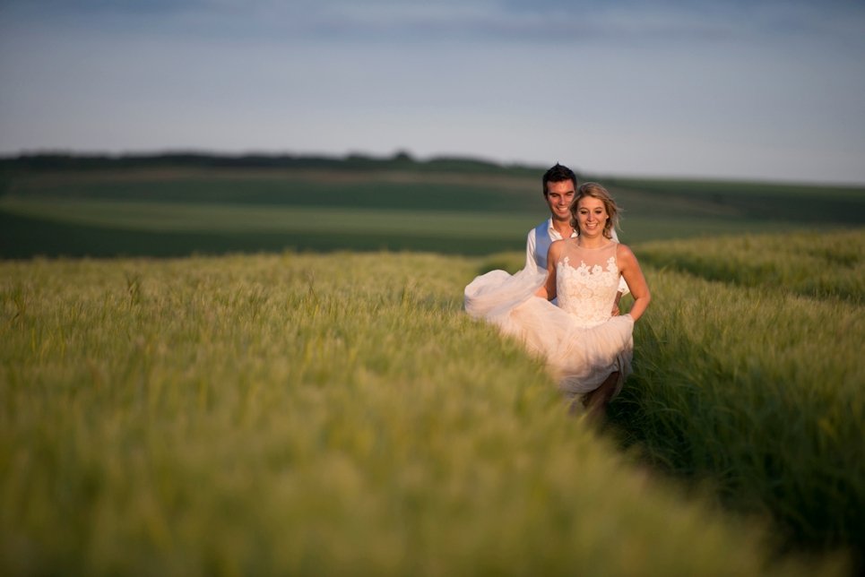 bridal-couple-fun-chasing-each-other